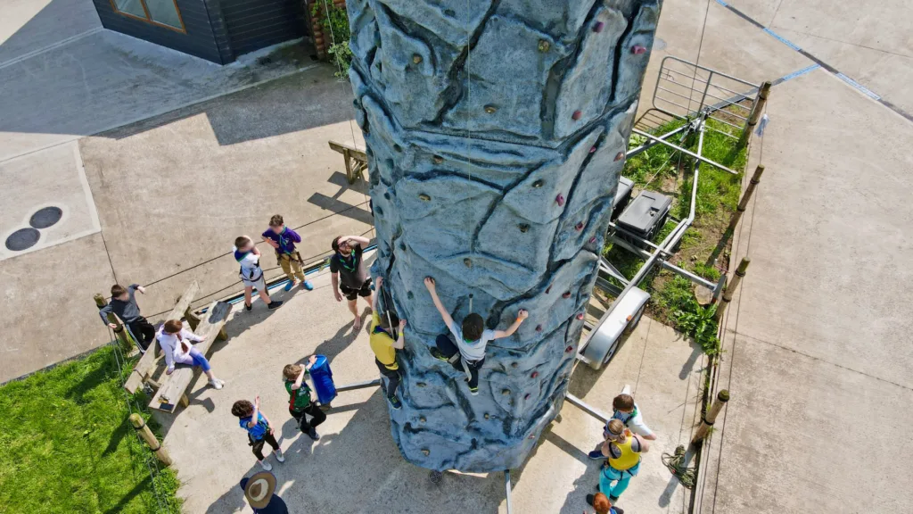 Young people tackling the climbing wall at Moira Lakes